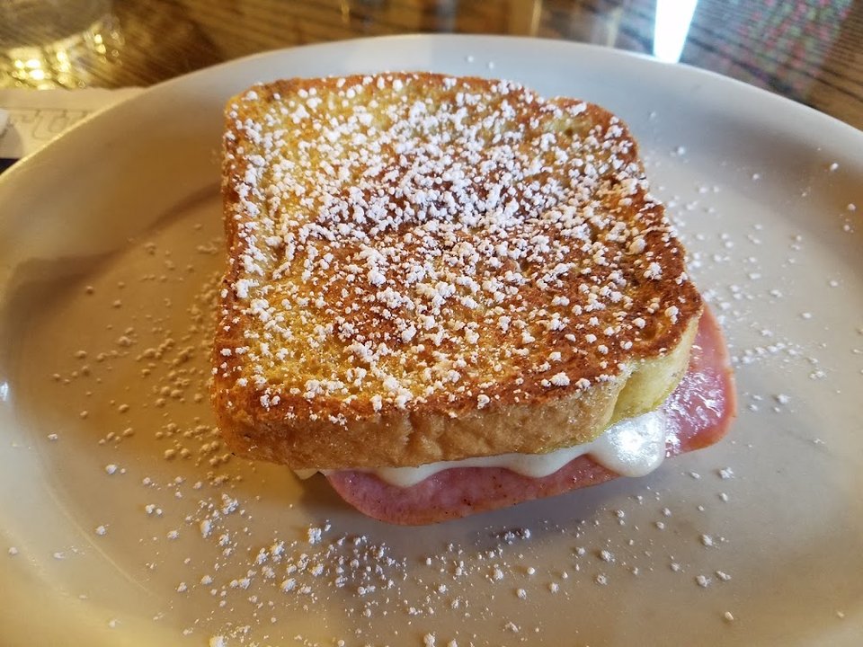 Hearty omelette served with toast and potatoes